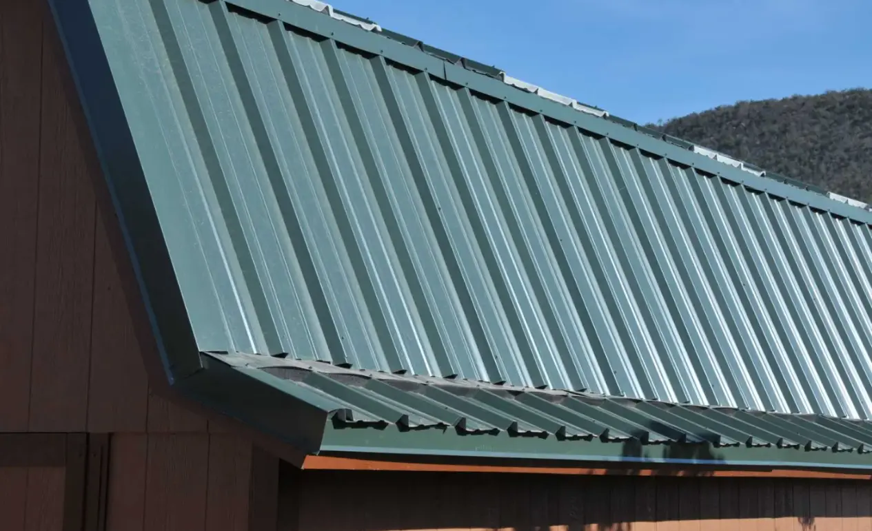 Metal roofing on custom storage shed - best shed roofing material for longevity and durability
