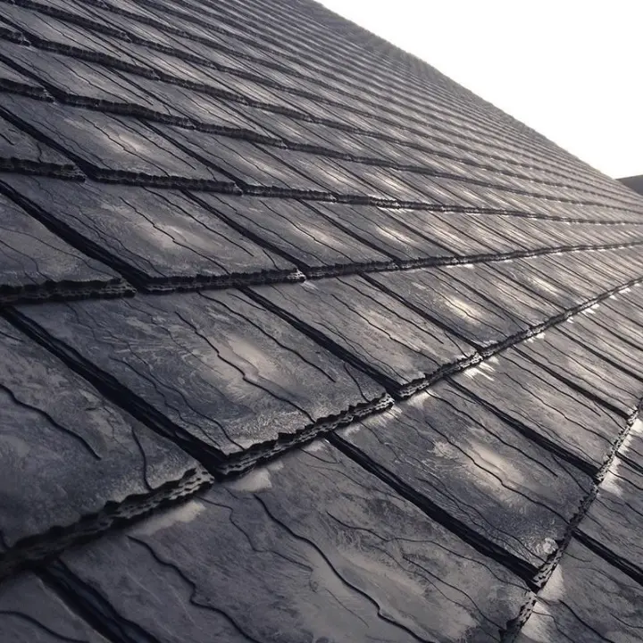 Asphalt shingle roof installation on backyard storage shed - affordable shed roofing option