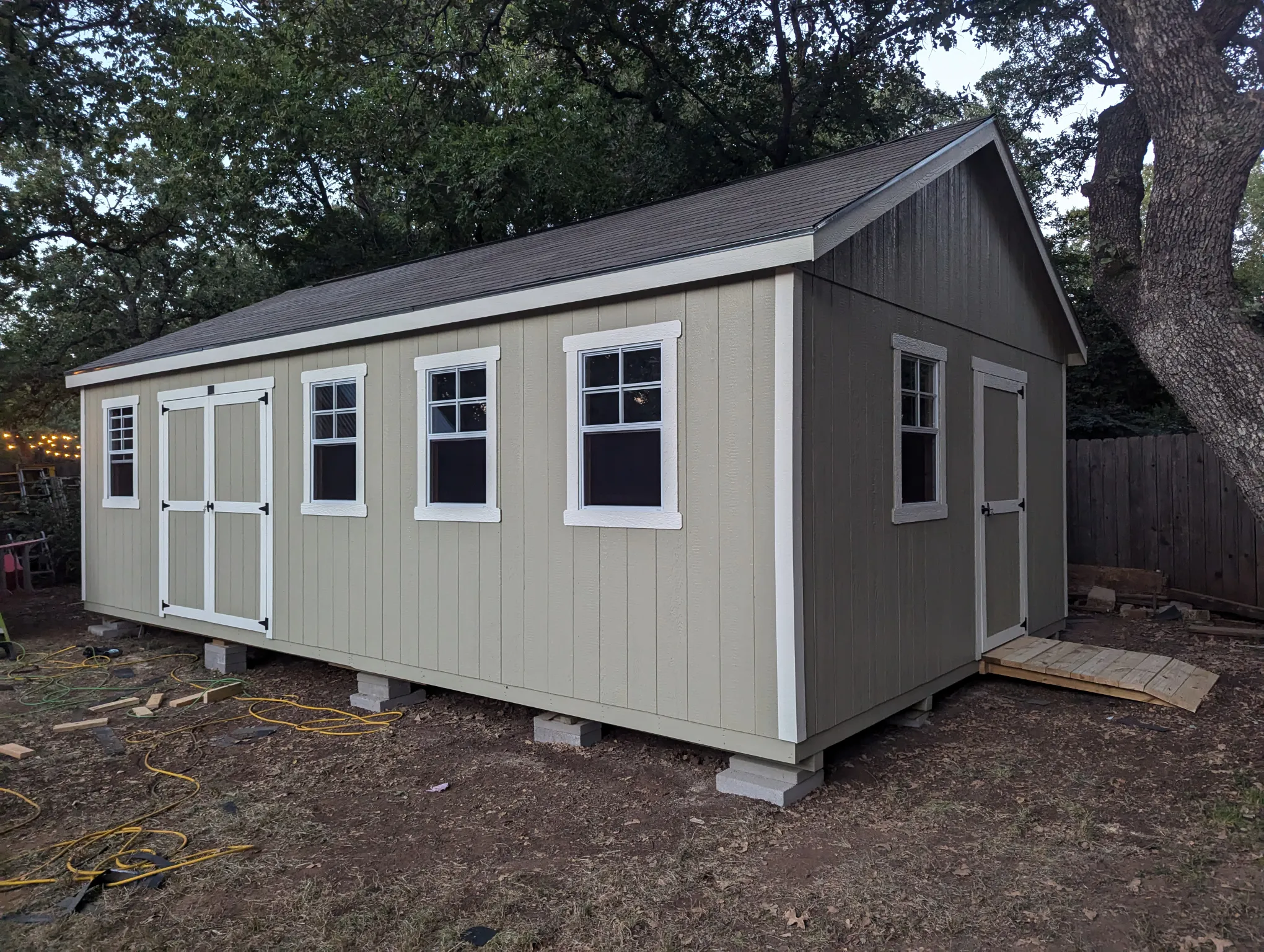 On-site shed construction with no crane or delivery truck required